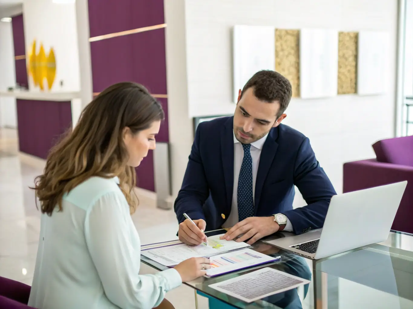 A professional advisor in a modern office setting, reviewing financial documents with a client, both smiling confidently, representing personalized financial advice.